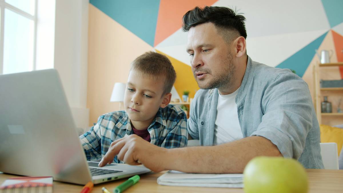 anonymous browsing online visualized as a family using a shielded laptop in a living room